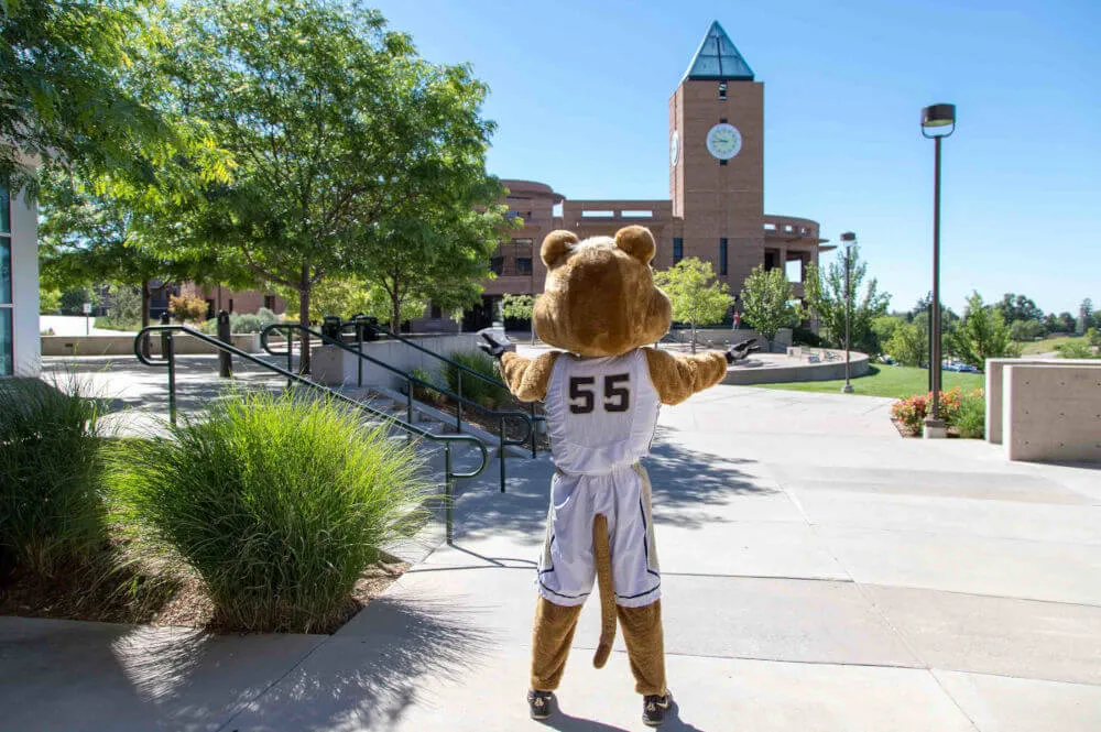 Clyde Gestures to a clocktower