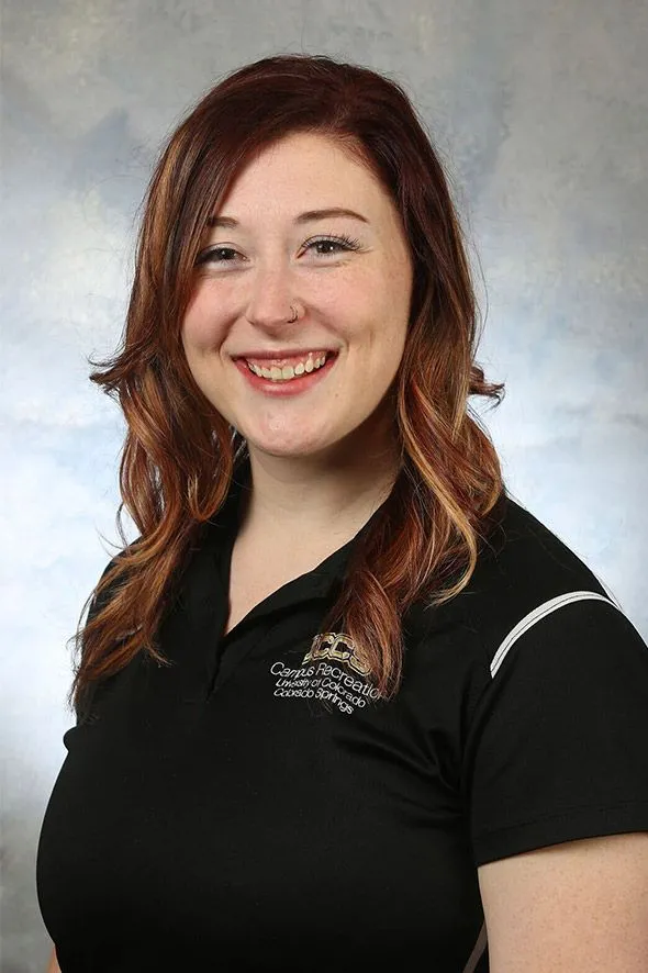 Krista Ziegler portrait with black employee shirt