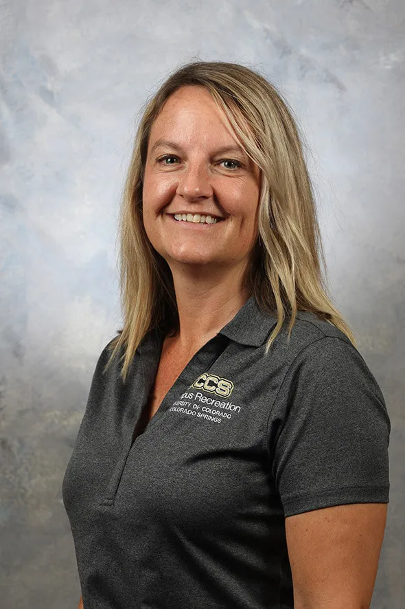 Mandy McBroom portrait with a grey employee shirt